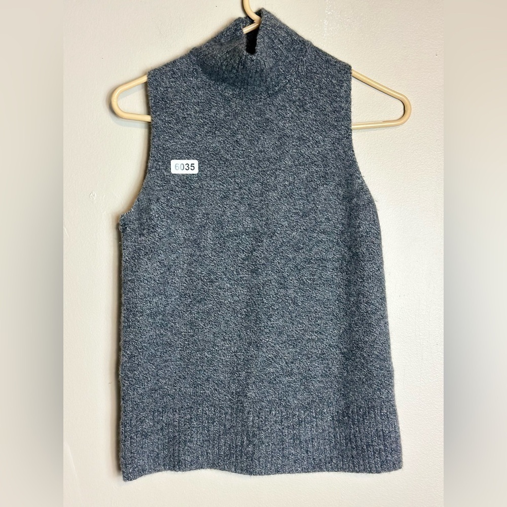 Ann Taylor cashmere medium 16 p2p 22 length preowned. There is a small hole